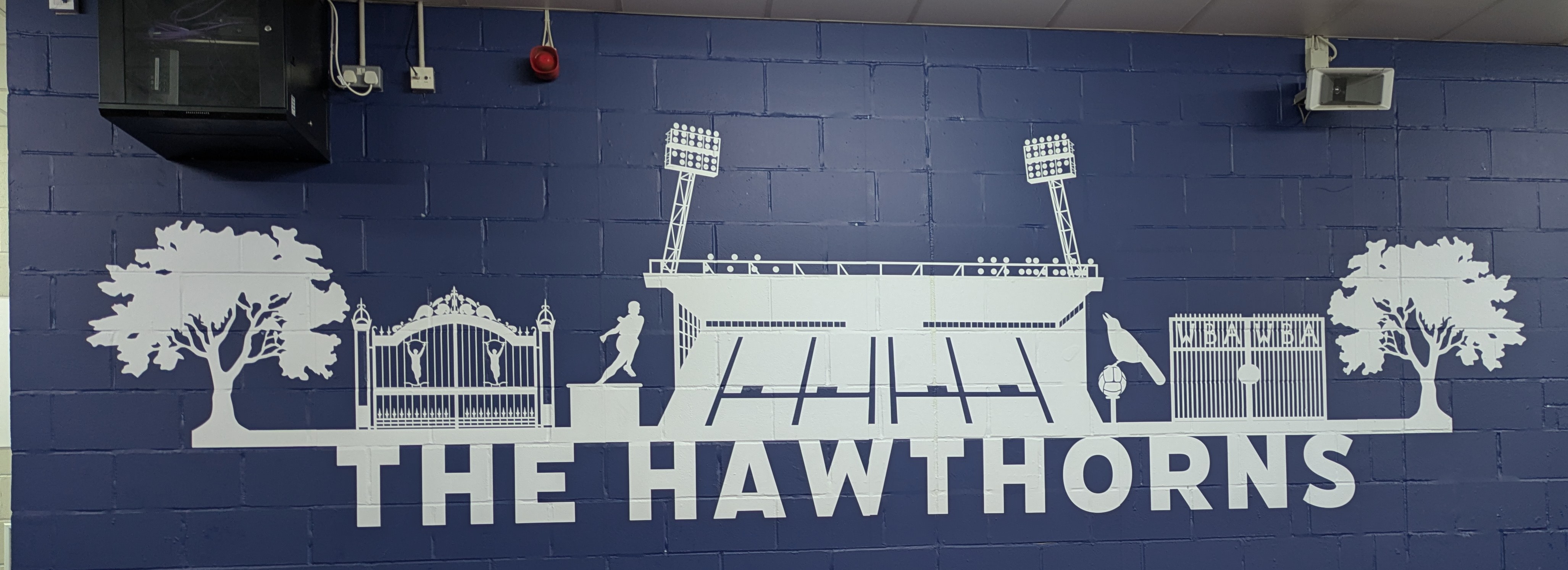 The Hawthorns mural on the concourse wall
